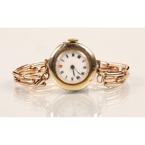 107 - 9 ct Ladies wristwatch, with rolled gold bracelet strap