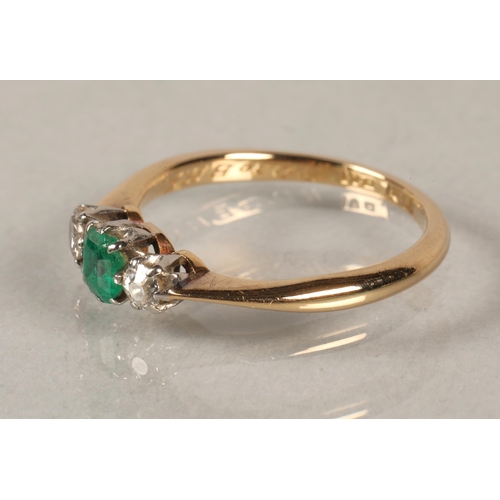 62 - 18 ct diamond and emerald ring.ring size J