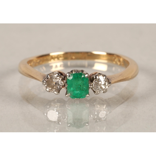 62 - 18 ct diamond and emerald ring.ring size J