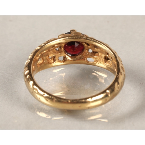 73 - 9 ct gold dress ring with garnet.ring size G/H