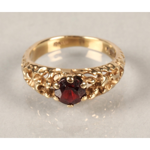 73 - 9 ct gold dress ring with garnet.ring size G/H