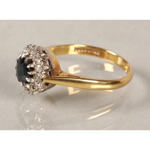 74 - 18 ct gold Diamond and sapphire ring.ring size L