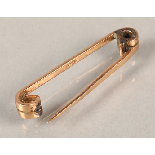 81 - 9 ct Rose gold brooch, 3 grams