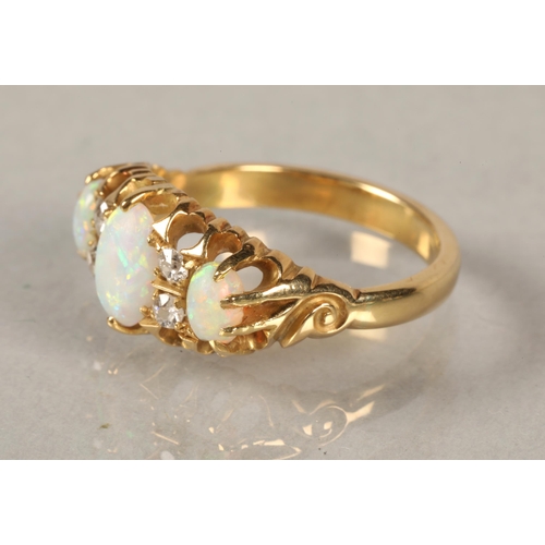 86 - Gold, diamond and opal dress ring,ring size L