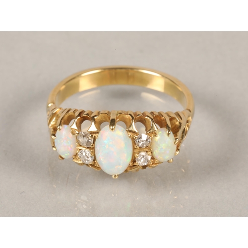 86 - Gold, diamond and opal dress ring,ring size L