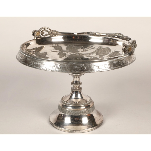 142 - Ornate silver plated cake basket with handle and raised base