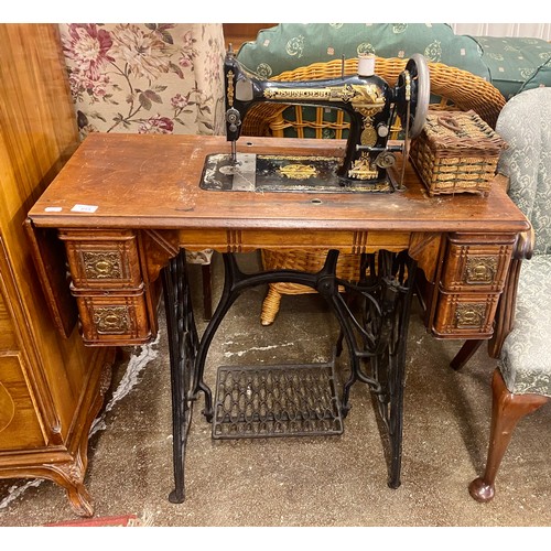 615 - Singer sewing machine, serial number 13163496 with treadle