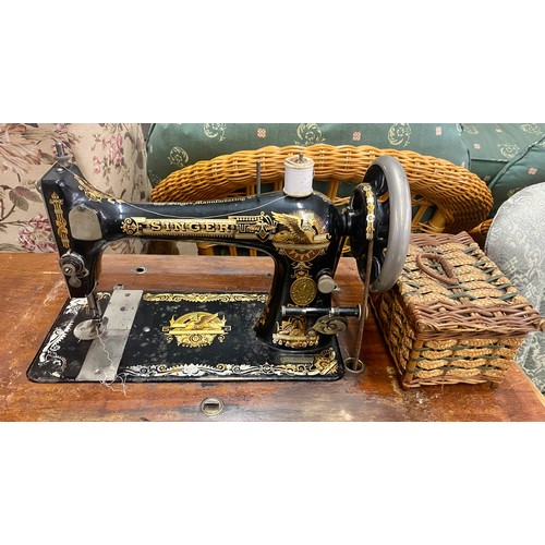 615 - Singer sewing machine, serial number 13163496 with treadle