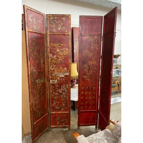 663 - Pair of large red oriental style free standing screens, 121 cm high 83 cm wide (2)