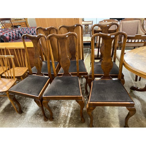 573 - Six walnut dining chairs with dark brown upholstery, H 105cm, W 52cm, D 44cm