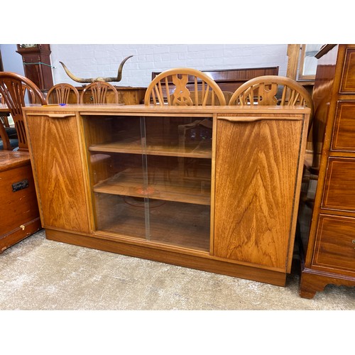 596 - Mid-century teak glazed bookcase, H 77.5cm, W 136.5cm, D 28cm