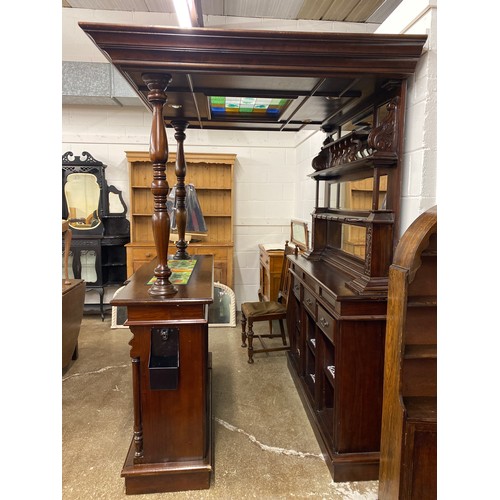 628 - Mahogany Bar, with colour glass canopy, glass back display with three drawers over shelving, the bar... 