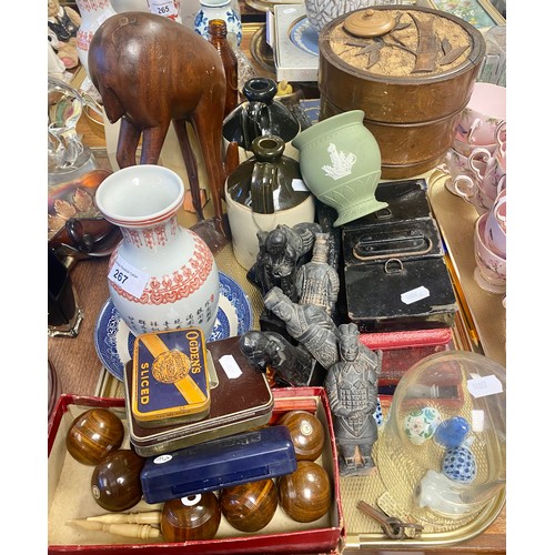 267 - Collection of decorative items to include animals, table boules, two flagoons, etc