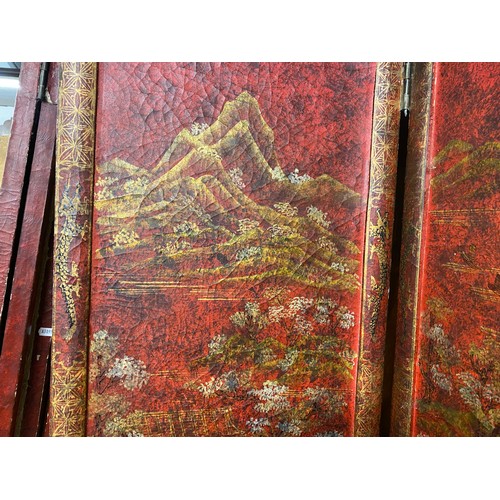 661 - Pair of large red oriental style free standing screens, 214 cm high 83 cm wide (2)