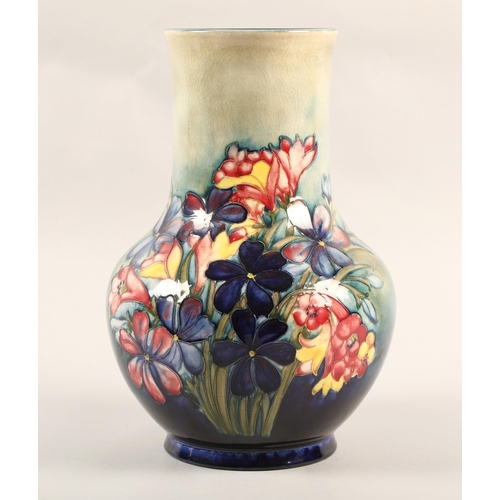 1 - Moorcroft pottery vase, decorated in the Spring flowers pattern, impressed marks, signed in blue, 31... 