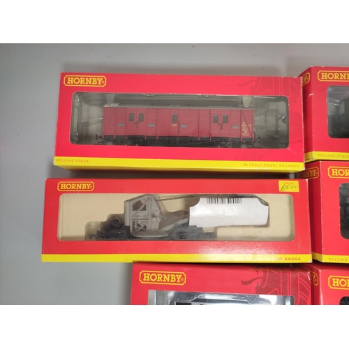 182 - Hornby Railways. Seven boxed 00 gauge rolling stock carriages and covered wagons to include BR Crims... 