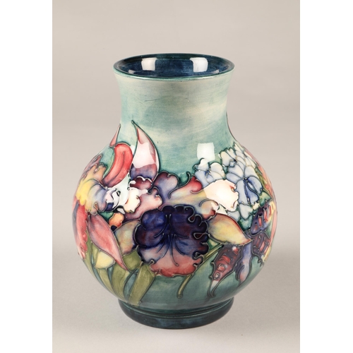 3 - Moorcroft pottery vase in the Orchid pattern, 20cm high.