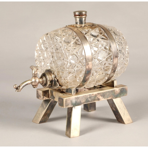 169 - An early 20th century, silver plated novelty crystal spirit barrel.