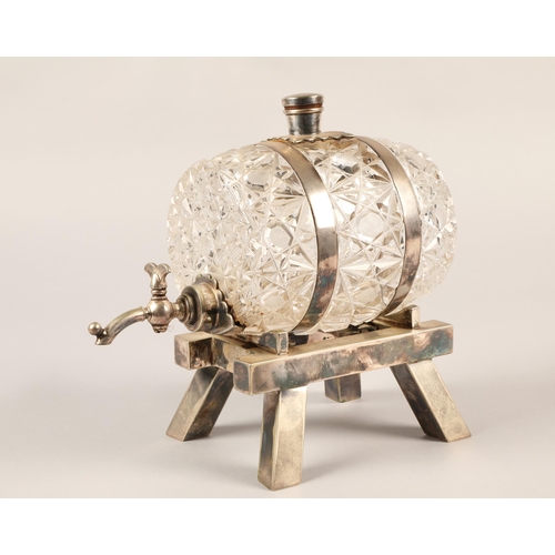 169 - An early 20th century, silver plated novelty crystal spirit barrel.