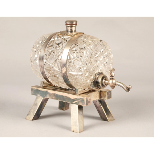 169 - An early 20th century, silver plated novelty crystal spirit barrel.