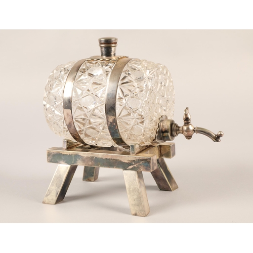 169 - An early 20th century, silver plated novelty crystal spirit barrel.