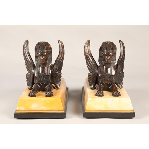 252 - Pair of bronze Egyptian revival winged Sphinx on marble base, overall length 28 cm  (2)