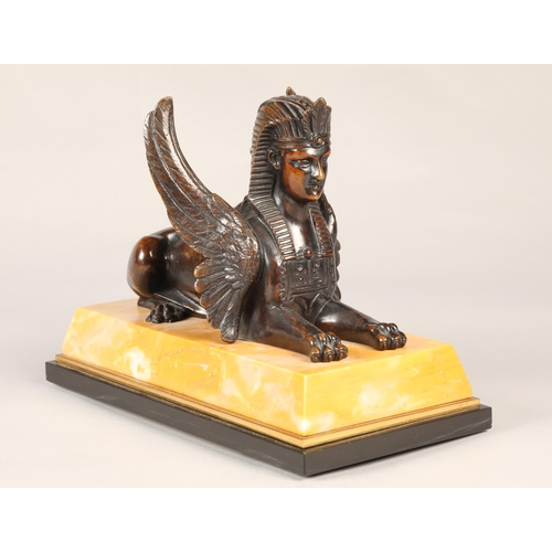 252 - Pair of bronze Egyptian revival winged Sphinx on marble base, overall length 28 cm  (2)