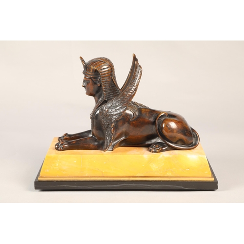 252 - Pair of bronze Egyptian revival winged Sphinx on marble base, overall length 28 cm  (2)