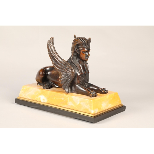 252 - Pair of bronze Egyptian revival winged Sphinx on marble base, overall length 28 cm  (2)