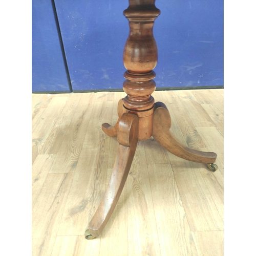 482 - Victorian walnut centre table with marquetry inlaid panel to the oval top, on turned column and trip... 