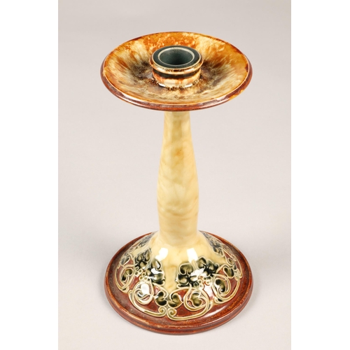 20 - Pair of Doulton Lambeth aesthetic movement candlesticks in the liberty style, 23cm high (2)