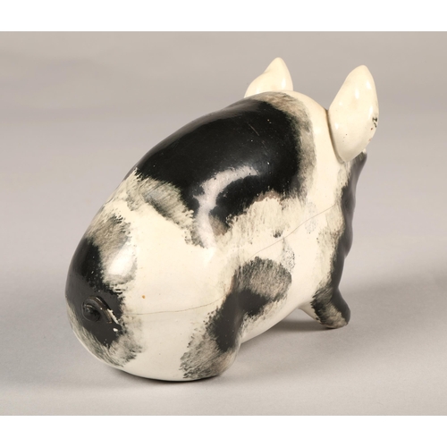 23 - Wemyss ware black and white pig, 17cm long.