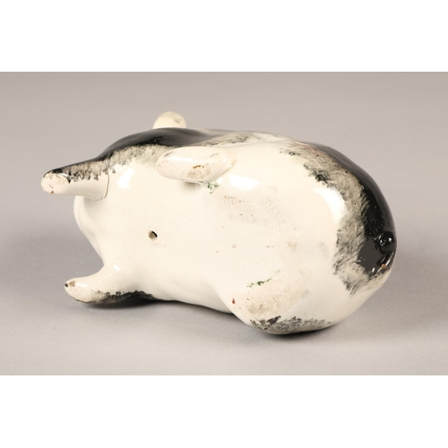 23 - Wemyss ware black and white pig, 17cm long.