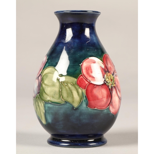 7 - Moorcroft pottery vase in the clematis pattern, 13cm high.