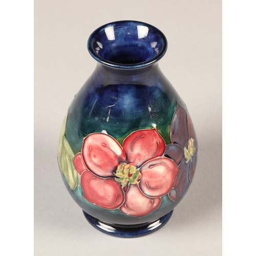 7 - Moorcroft pottery vase in the clematis pattern, 13cm high.