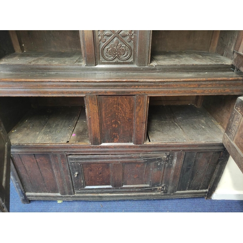 507 - William and Mary oak court cupboard inscribed to the frieze with initials and dated 1691, above foli... 