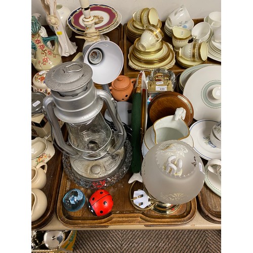 240 - Chalwyn paraffin lamp, two other lamps, clock, embossed pottery hunting jug etc.