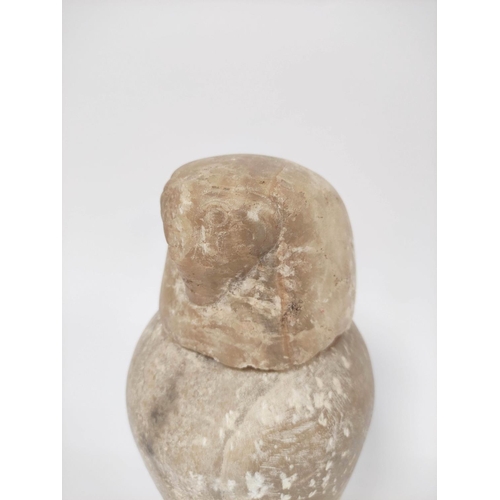 379 - Egyptian alabaster canopic jar in the Ptolemaic period style, the stopper in the form of human-heade... 