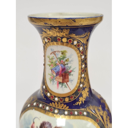 307 - Pair of Sevres style Continental porcelain vases decorated with panels of winged putti and objects o... 