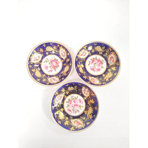 312 - Three early 19th century porcelain cabinet cups and saucers, decorated with hand painted pink cabbag... 