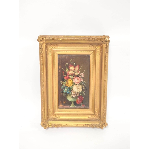 221 - Early 20th Century School.Still life of mixed flowers in a vase.Oil on board.Initialled WP,27cm x 15... 