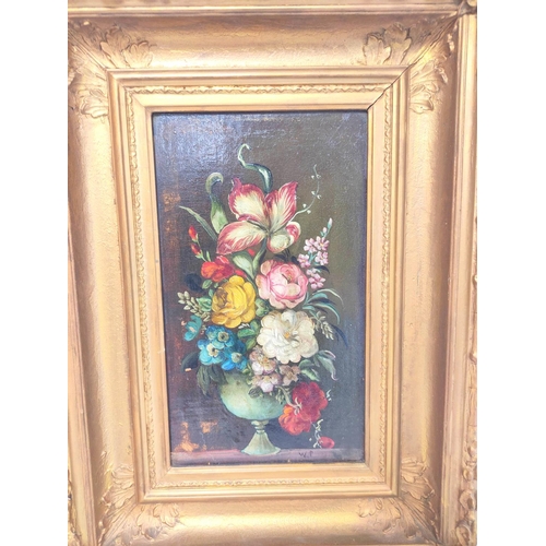 221 - Early 20th Century School.Still life of mixed flowers in a vase.Oil on board.Initialled WP,27cm x 15... 