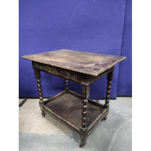 450 - Antique oak side table with drawer and undertier, with gadrooned edges and carved decoration upon bo... 