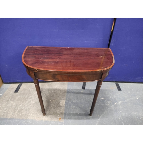 456 - Early 19th century mahogany card table of almost semi-circular shape with tulipwood crossbanding upo... 