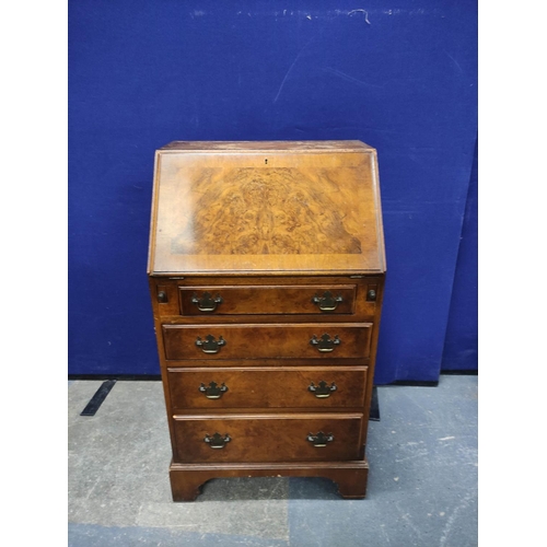 457 - Burr walnut small bureau of early 18th century style with four graduated drawers. H96cm W53cm D40cm