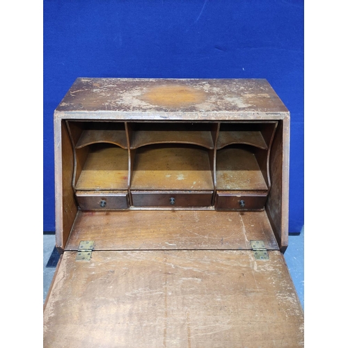 457 - Burr walnut small bureau of early 18th century style with four graduated drawers. H96cm W53cm D40cm