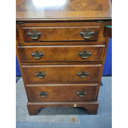 457 - Burr walnut small bureau of early 18th century style with four graduated drawers. H96cm W53cm D40cm