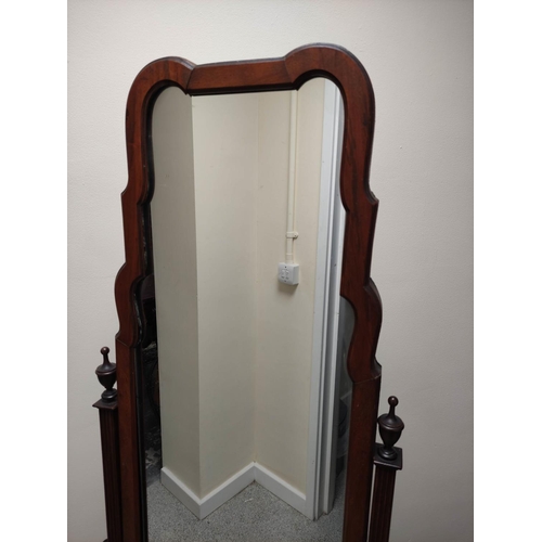 459 - Mahogany cheval mirror with shaped arched top, in the Queen Anne manner, upon reeded supports and sh... 