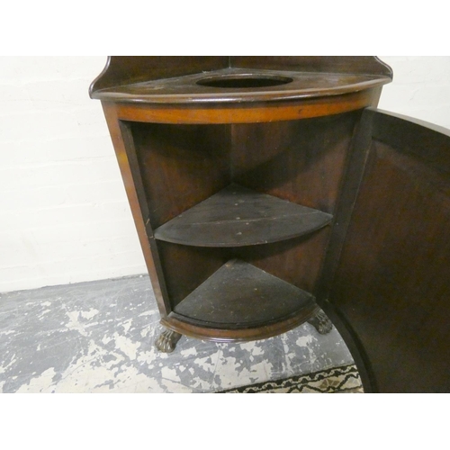 468 - 19th century Irish style mahogany corner wash stand, with three quarter gallery back with circular a... 