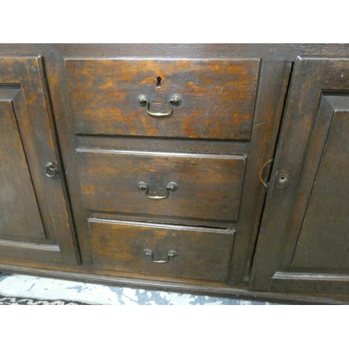 469 - Antique 18th century style oak dresser base with three central drawers flanked by cupboard doors, on... 